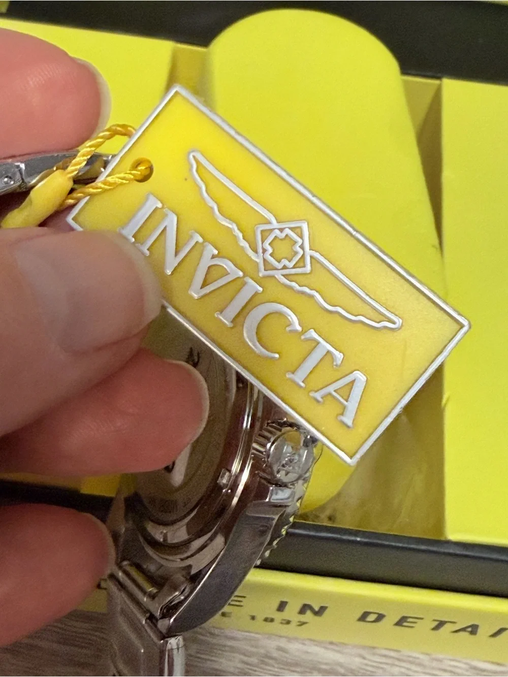 Invicta Pro Diver series stainless steel watch featuring a striking red dial